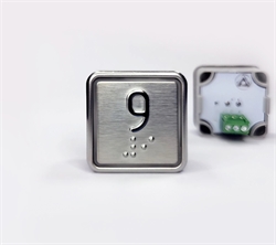 Кнопка приказа квадратная. Cимвол: 9-й этаж; код Брайля: имеется; материалы: нержавеющая сталь, алюминий, пластик; подсветка: красная; установочное место: 32,5 мм.